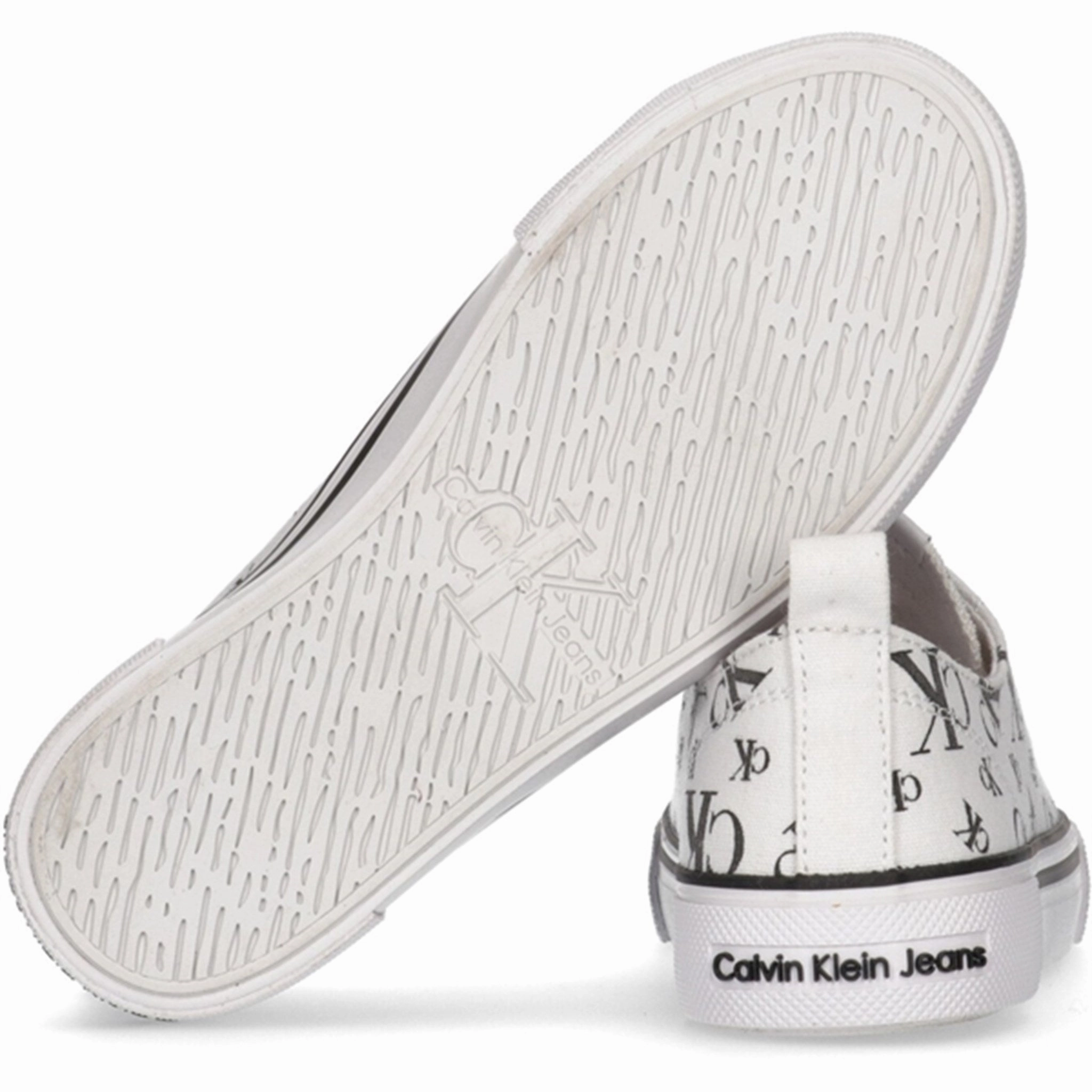 Calvin Klein Logo All Over Low Cut Lace-Up Sneakers White Comfort In Layers Sleek Essentials