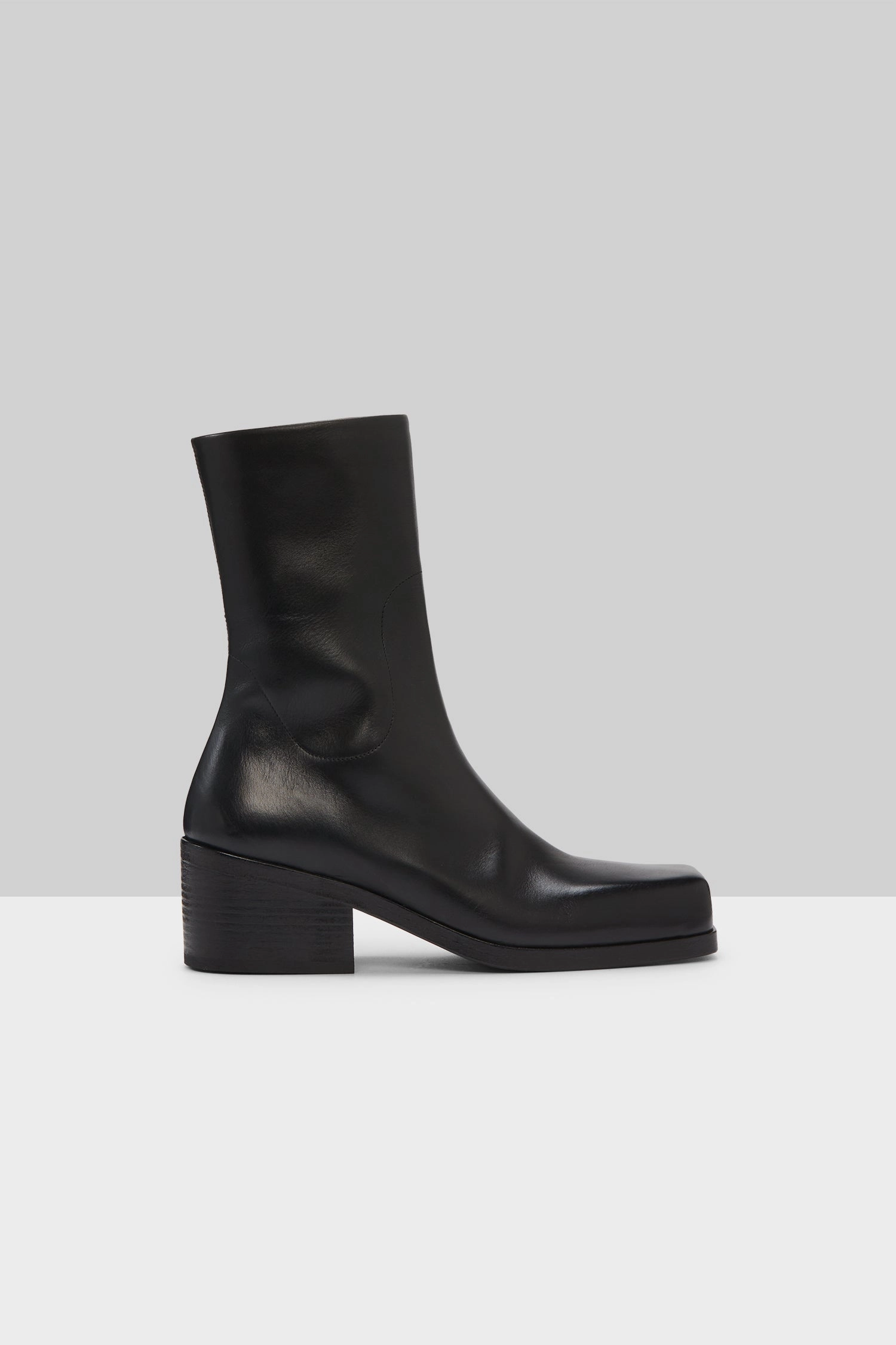 Cassello Tronchetto Leather Ankle Boot In Black Bold In Simplicity