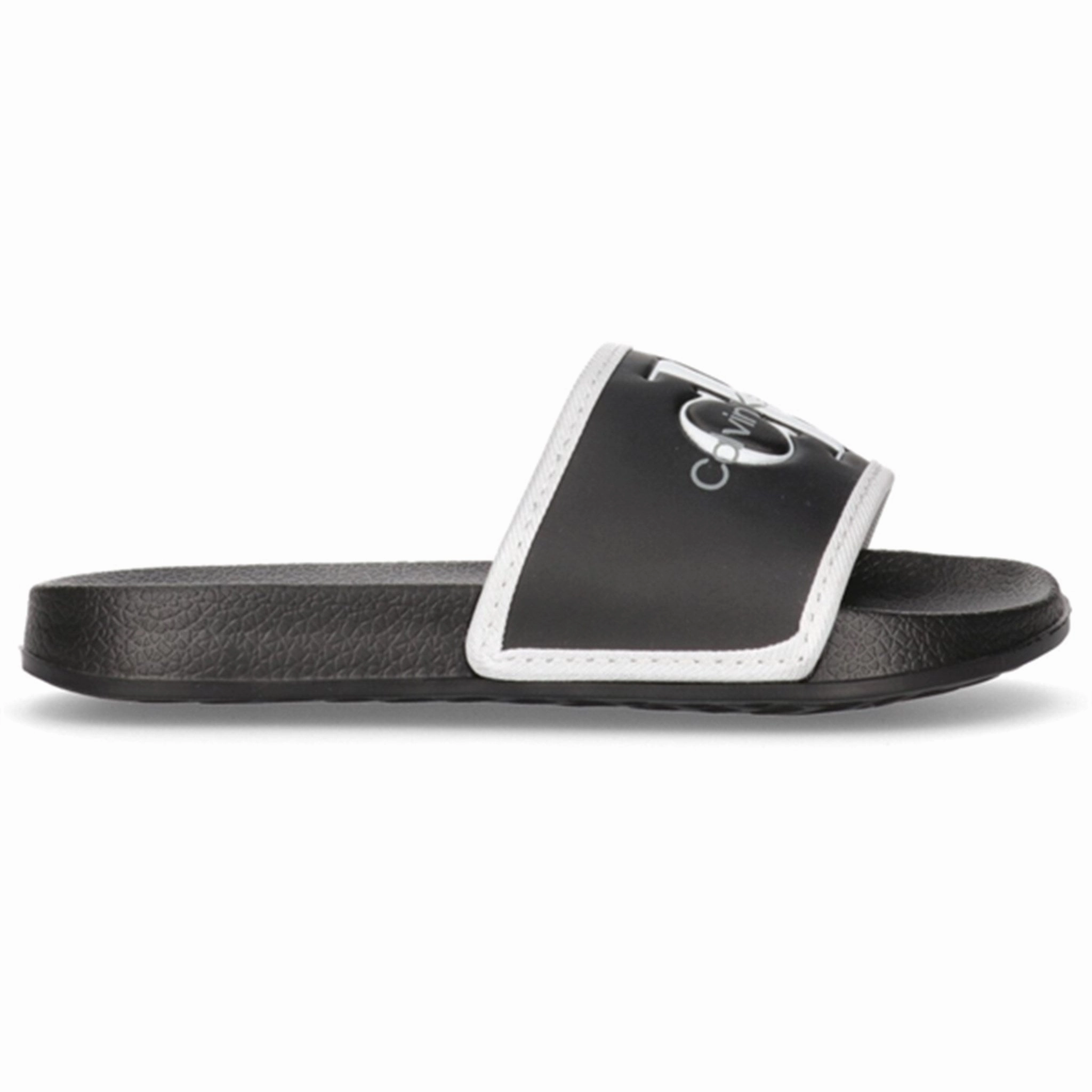 Low-Key Luxe Calvin Klein Logo Pool Slide Black/White