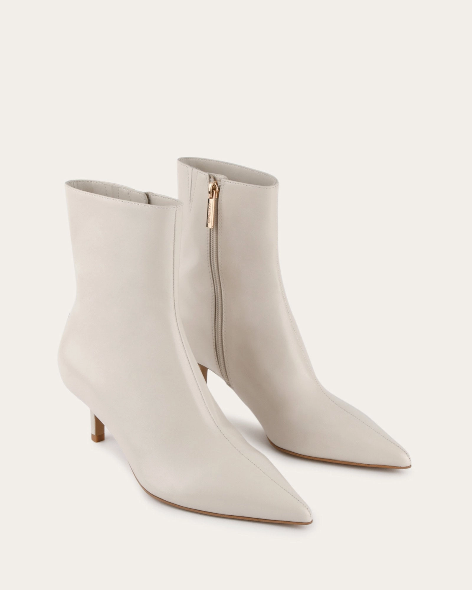 Style Forward Refined Presence Winnie Mid Ankle Boots Off White Leather
